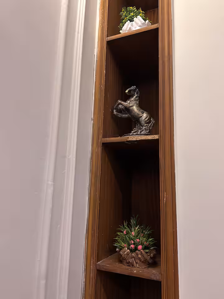 Tall shelving unit with decor