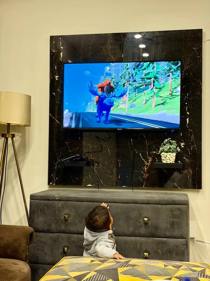Living room with TV and cozy seating